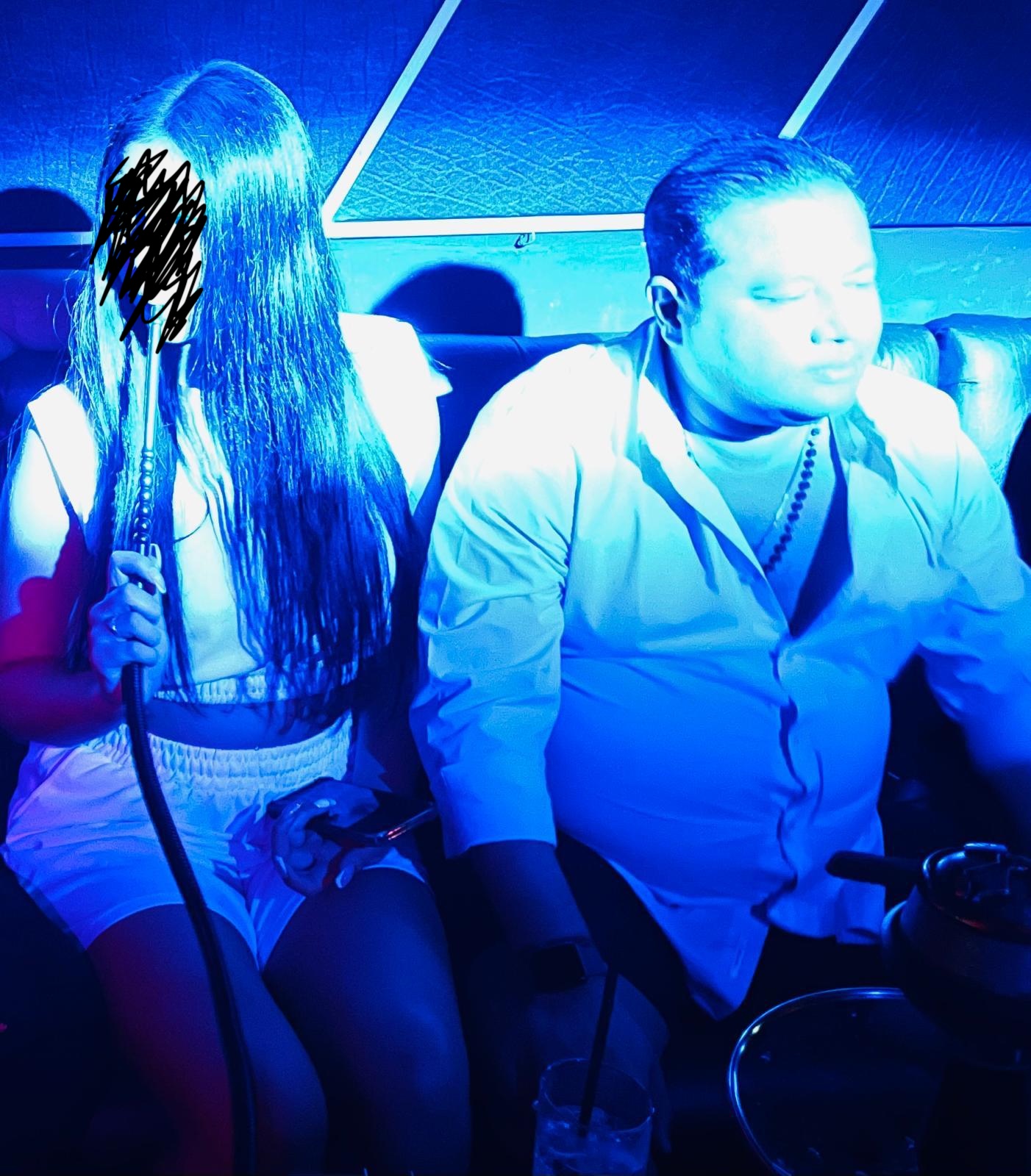 Context — blue-lit hookah club